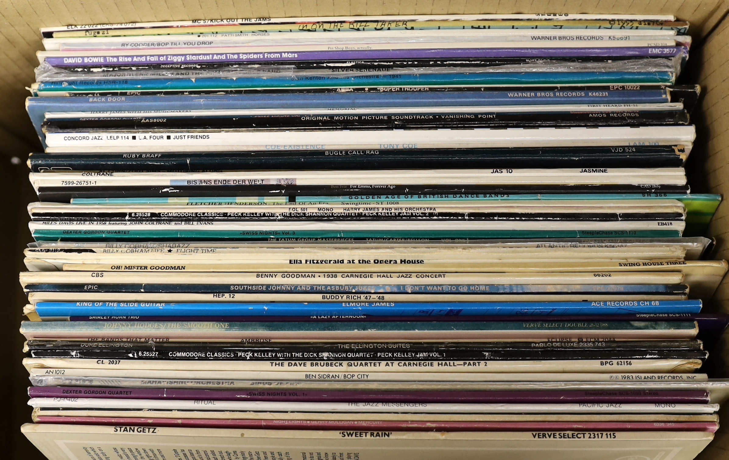 Fifty mainly jazz and pop LPs, including Stan Getz, Dexter Gordon, Dave Brubeck, Buddy Rich, Benny Goodman, Ella Fitzgerald, Art Tatum, John Coltrane, ABBA, David Bowie, Ry Cooder, etc.